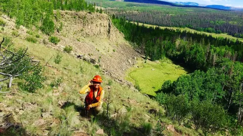 Photo of Rachel working with the U.S. Forest Service