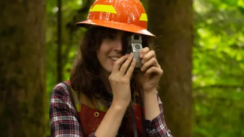 Forestry student on the job. 